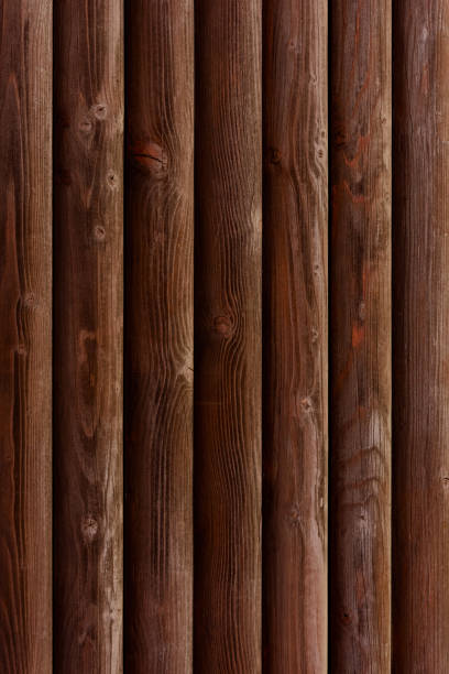 istock Modern walls are dark brown bars, dark texture. 1989680769