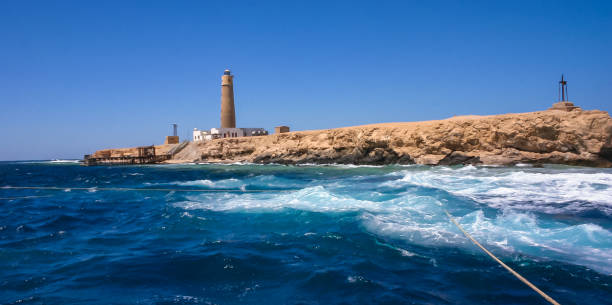 lighthouse of big brother, brother islands, red sea, egypt - big brother stock-fotos und bilder
