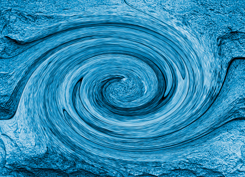 Computer generated swirl of water with blue tones, sea and wind waves