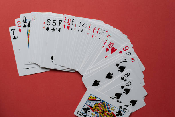 istock person who plays playing cards 1989748694