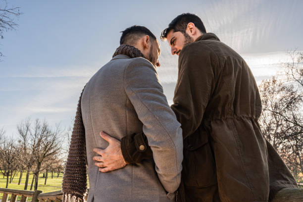 istock gay couple in love, hugging 1989818051