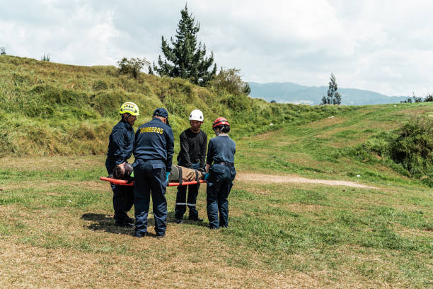 istock Paramedics carrying accident victim on a stretcher 1989825541