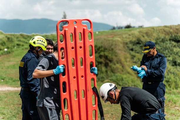 istock Paramedics preparing a stretcher outdoors 1989825576
