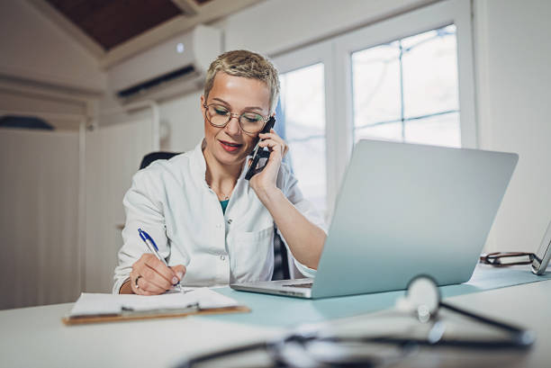 istock Female doctor at the office 1989832541