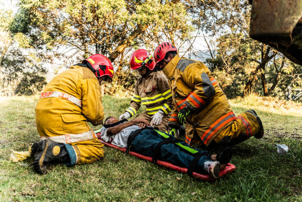 istock Firefighters helping a car accident victim 1989835739