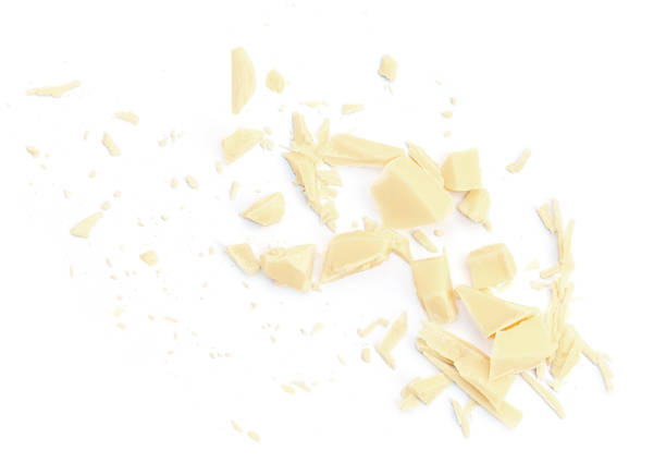 istock White Milk Chocolate crumbs  isolated on white background. Top view. Flat lay 1989838452