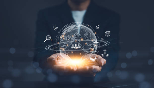 istock Businessman hand holding virtual global Internet connection metaverse. Business global internet connection application technology and digital marketing. Financial and bank, search information online. 1989862155