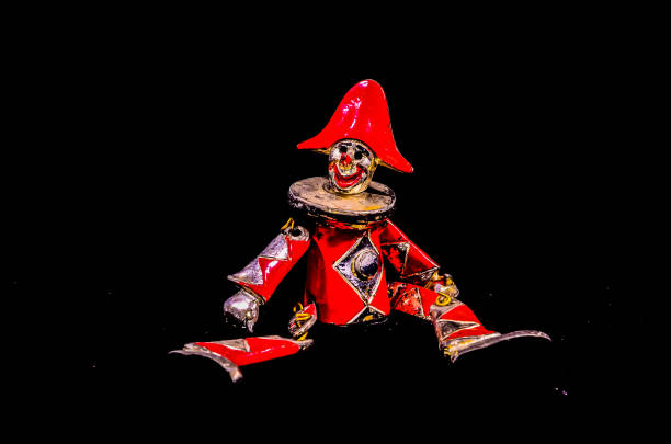 Metal Handmade Statue of a Carnival Puppet on Black Background