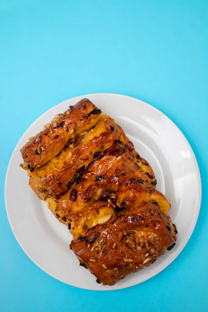 istock typical portuguese fruit cake Bolo rainha on white plate 1989882077