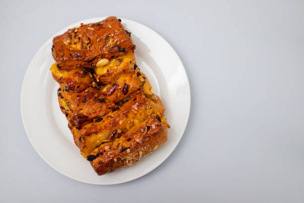 istock typical portuguese fruit cake Bolo rainha on white plate 1989882086