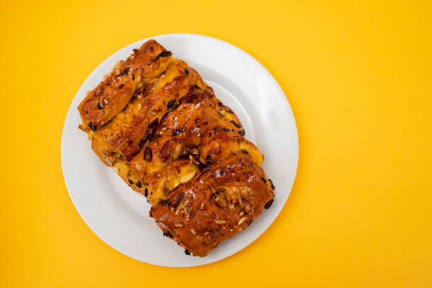 istock typical portuguese fruit cake Bolo rainha on white plate 1989882092
