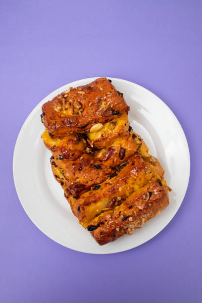 istock typical portuguese fruit cake Bolo rainha on white plate 1989882100