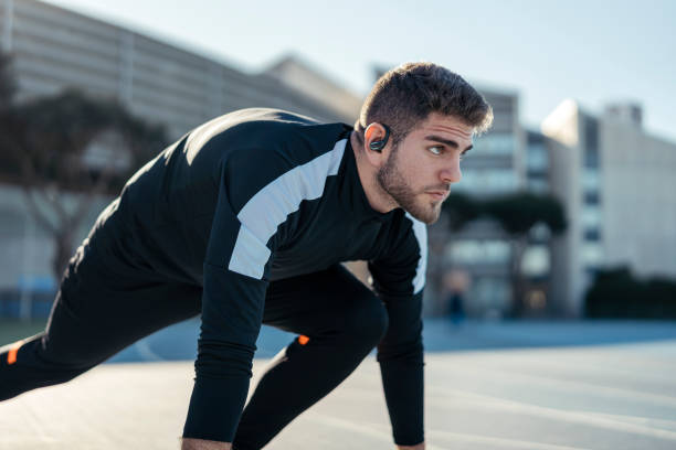 istock Caucasian man working out outdoors on a sunny day 1989886267