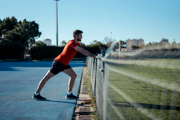 istock Caucasian man working out outdoors on a sunny day 1989887878