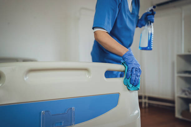 istock Nurse cleaning hospital ward 1989921962