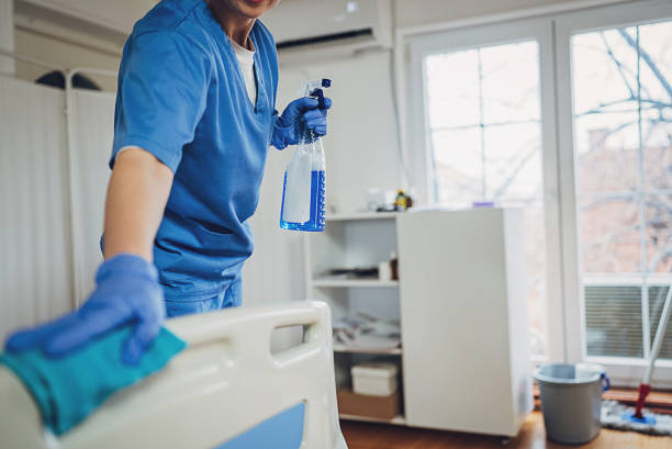 istock Nurse cleaning hospital ward 1989925089