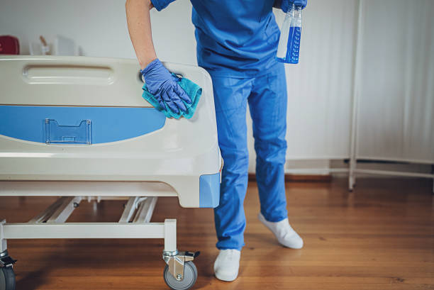 istock Nurse cleaning hospital ward 1989930235
