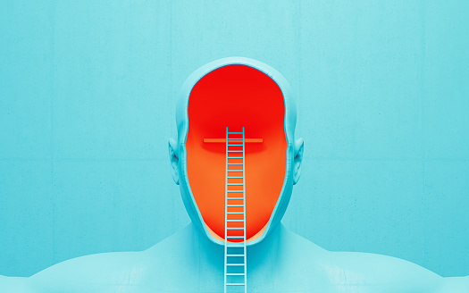 Empty human head and blue ladder over blue concrete wall background. Horizontal composition.