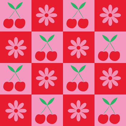 Checkered cherries and retro flowers seamless pattern on red and pink checkerboards. For fabric, textile and home décor