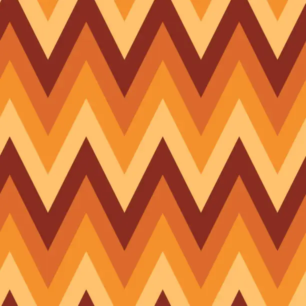 Vector illustration of Retro 70s chevron seamless pattern in orange, mustard yellow ,brown and cream.