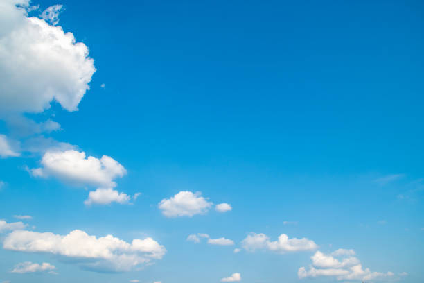 istock Template with blue sky and clouds with empty space for text. Background for cover on the theme of family vacation with copy space. 1989946905
