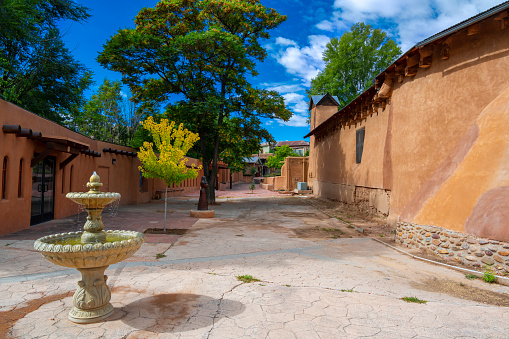 Santa Fe, NM: A courtyard at the Randall Davey House/Audubon Center. Built in 1847 by painter Randall Davey, the house is now an education center for the Audubon Society.