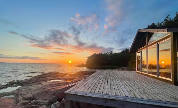 istock Beach house terrace at summer sunset 1989960032