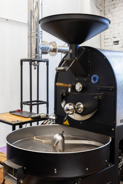 istock Industrial coffee roaster, close up vertical photo 1989974802