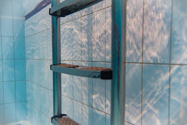 istock Underwater photo, ladder in the pool, close-up. 1989997683