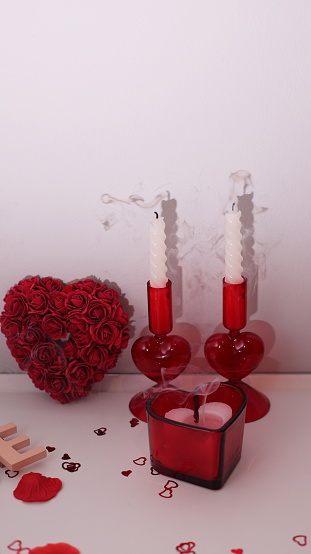 Extinguished candle with smoke , hearts shapes, end of love, over of something concept