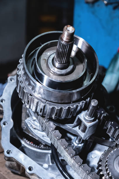 istock Chain with gears of a disassembled transfer case. Gear synchronization and diagram, transmission detail in a makeshift workshop 1990007012