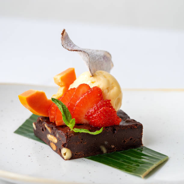Exquisite brownie with fruit and ice cream