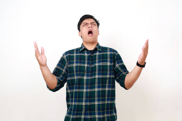 istock Wow surprised face expression of asian boy standing while looking above like receiving something 1990020017