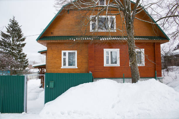 Rustic cabin in winter snow.