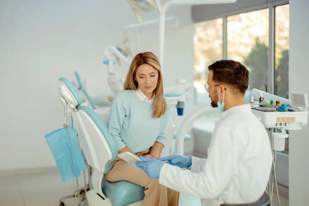istock Having a Consultation With Her Dentist 1990034880