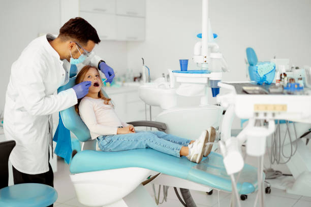 istock Gentle care in the dentist's chair 1990051572