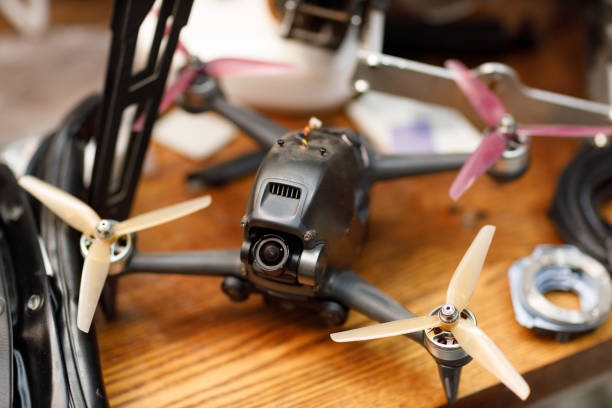 istock Workshop and repair production quadrocopter drones with parts stuff 1990057832