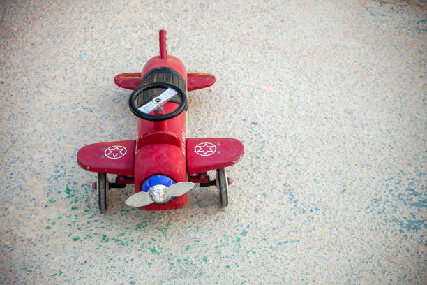 antique tin toy plane under restoration