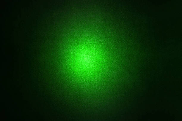 Black dark green orange red brown shiny glitter abstract background with space. Twinkling glow stars effect. Like outer space, night sky, universe. Rusty, rough surface, grain.