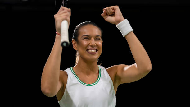 istock Tennis player cheering in court 1990149989