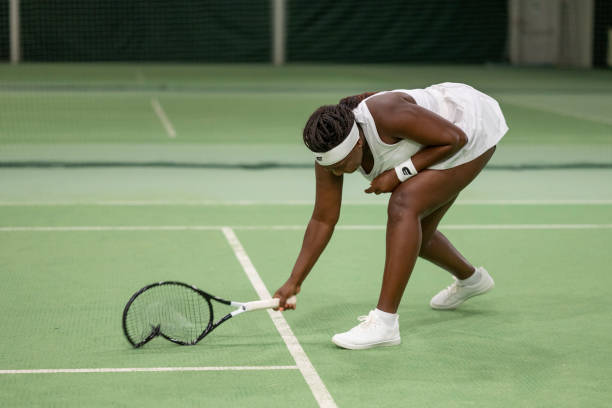 istock Tennis Player is disappointed after match 1990150013