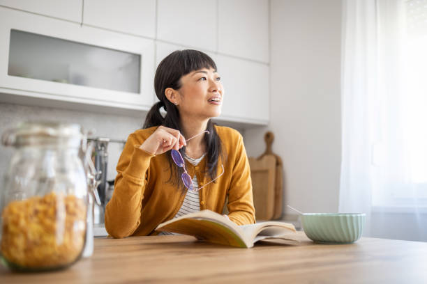 istock I like to start my day on weekends with a light breakfast and a good book 1990153099
