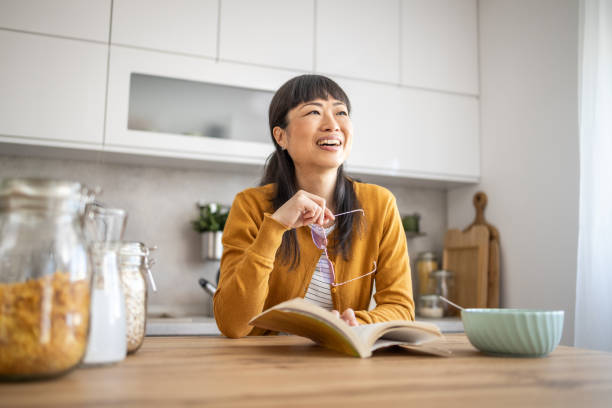 istock I like to start my day on weekends with a light breakfast and a good book 1990153103