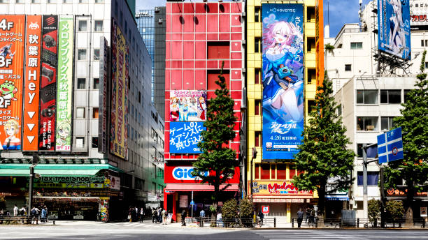 Tokyo, Japan, April 29 2023  - Wide image, vertically corrected of colourful game stores in the Ahikabara district. Large comic figures visible on the buildings