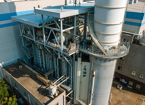 Wuhan, China – June 08, 2023: A staircase leading up the side of an industrial chimney in a thermal power plant