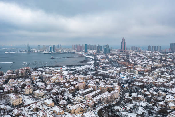 istock Qingdao city snowing 1990204274