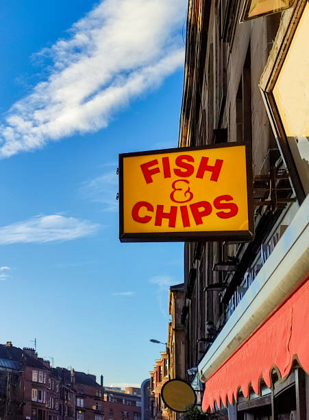 fish and chips sign at glasgow scotland england UK