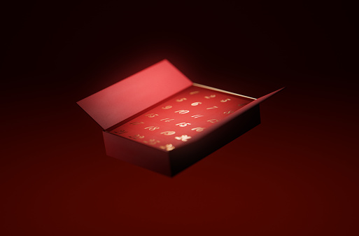 A red and gold advent calendar in a red studio environment. Part of a series digitally created 3D images with a Christmas advent calendar theme.