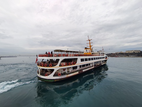 Traditional passenger boat travelling at bosphorus marmara sea in istanbul turkey