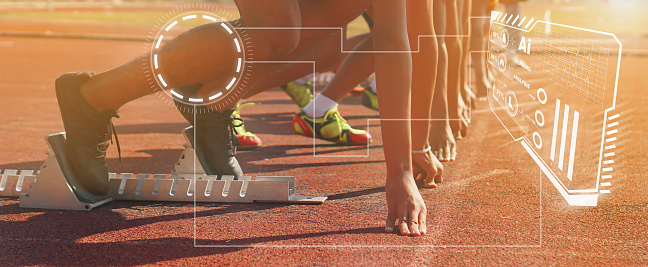 Sprint athletes use AI tools to analyze their running.Close up of runners feet on the track field